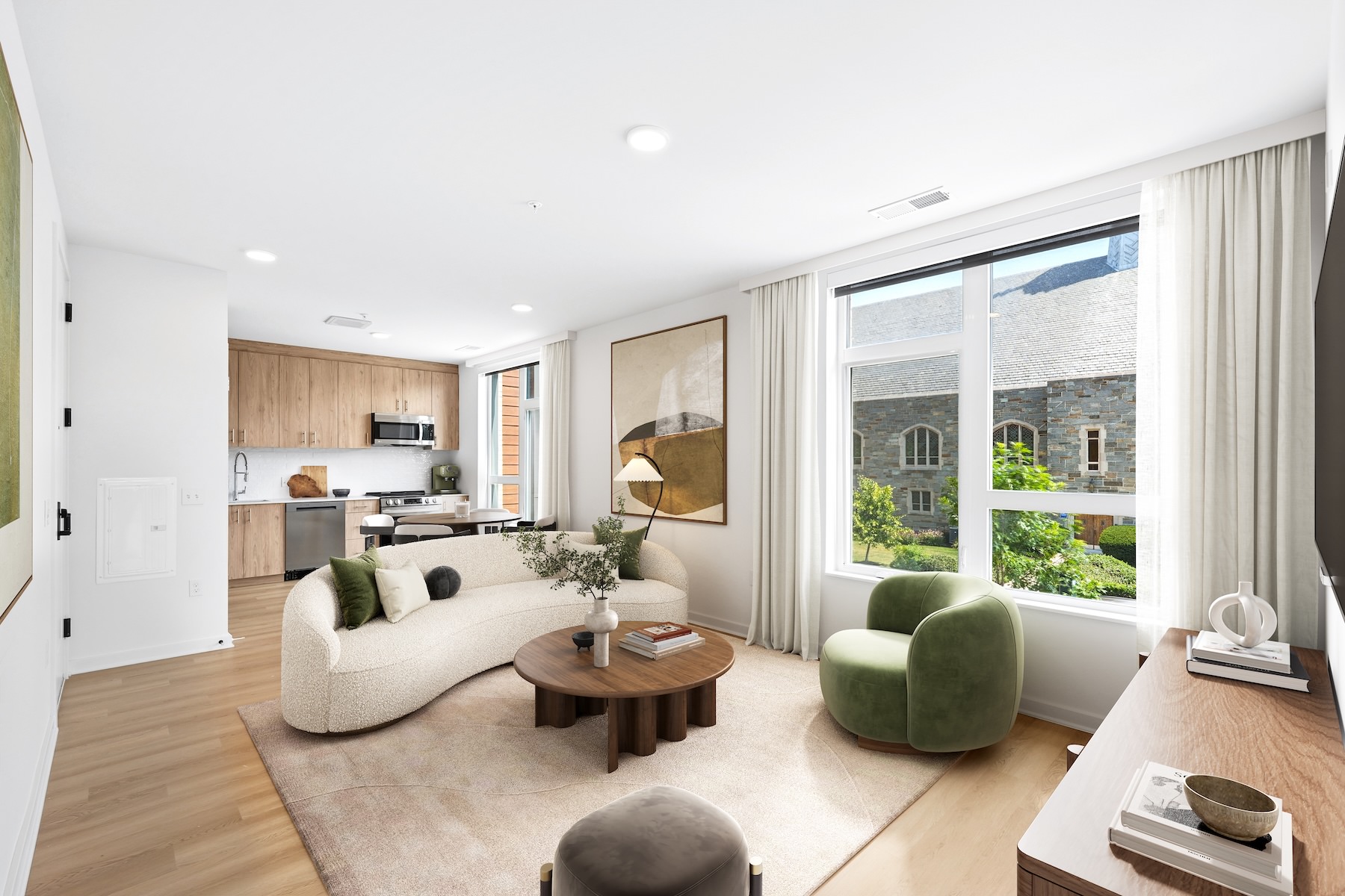 a living room with a couch and chairs