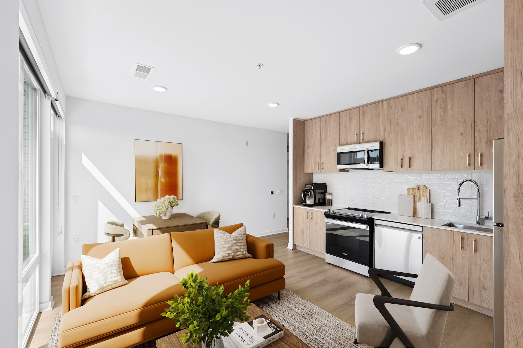 a living room with a couch and chair