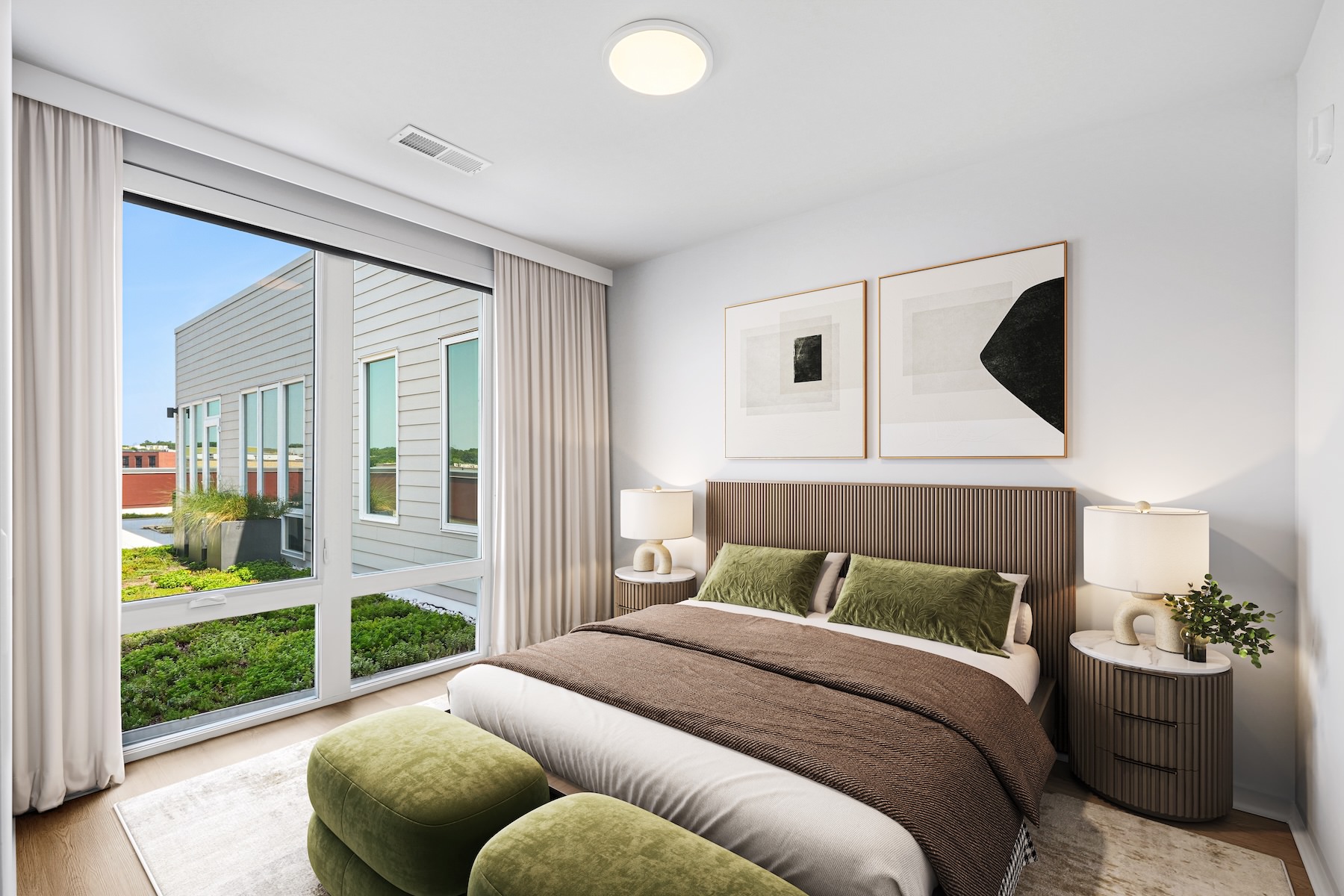 a bedroom with a bed and two nightstands