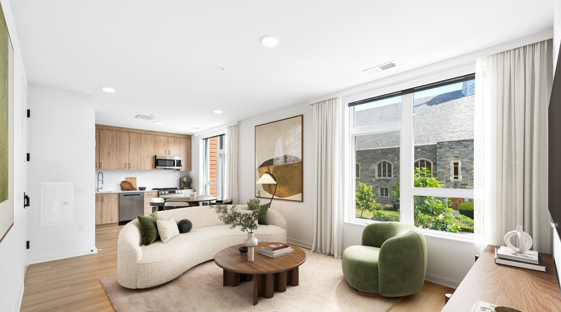 6th floor penthouse living room and kitchen with large window