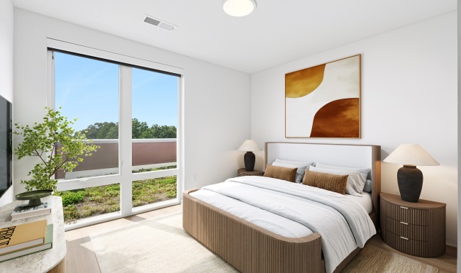 primary bedroom with view of terrace