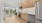 open kitchen with steel appliances and wood cabinets