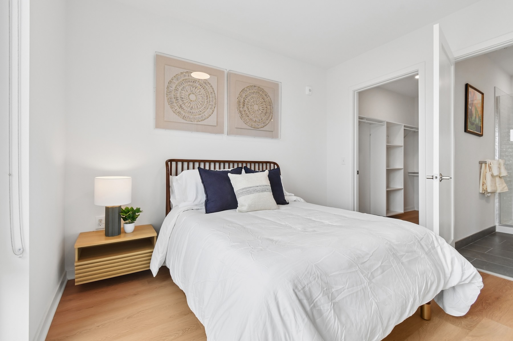 a bedroom with a walk-in closet